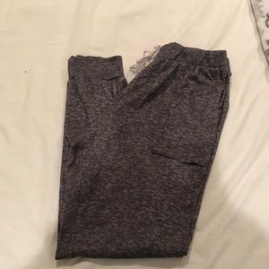 Cute heather grey soft sweatpants with drawstring waistline and front pockets.